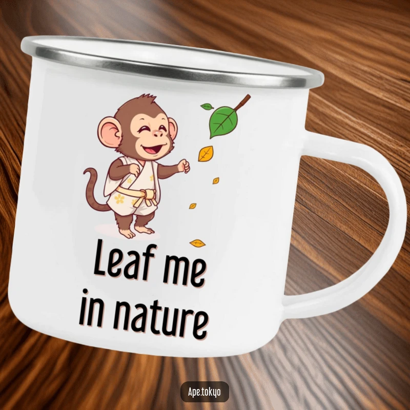 Funny Camping Mug: A silly ape in a short kimono playfully reaches for a falling leaf in an outdoor setting.