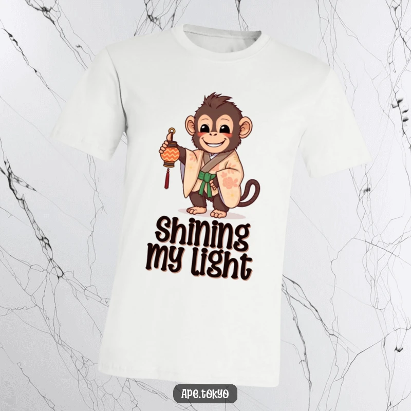 Funny T-Shirt: A beaming ape adorned in a beautifully patterned kimono holds a small, glowing lantern.